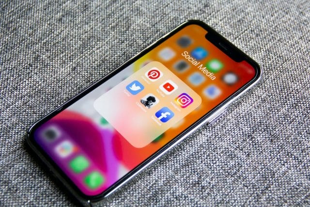 Thrive in the Vibrant Filipino Marketing Scene: How to Navigate and Triumph with Ad Agencies in the Philippines | Lime Digital Asia black iphone 5 on gray textile
